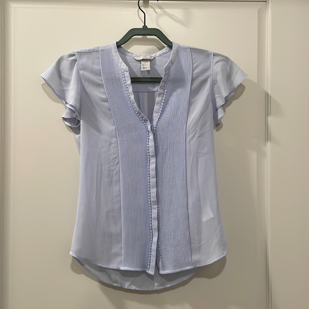 Light blue blouse with flutter sleeve